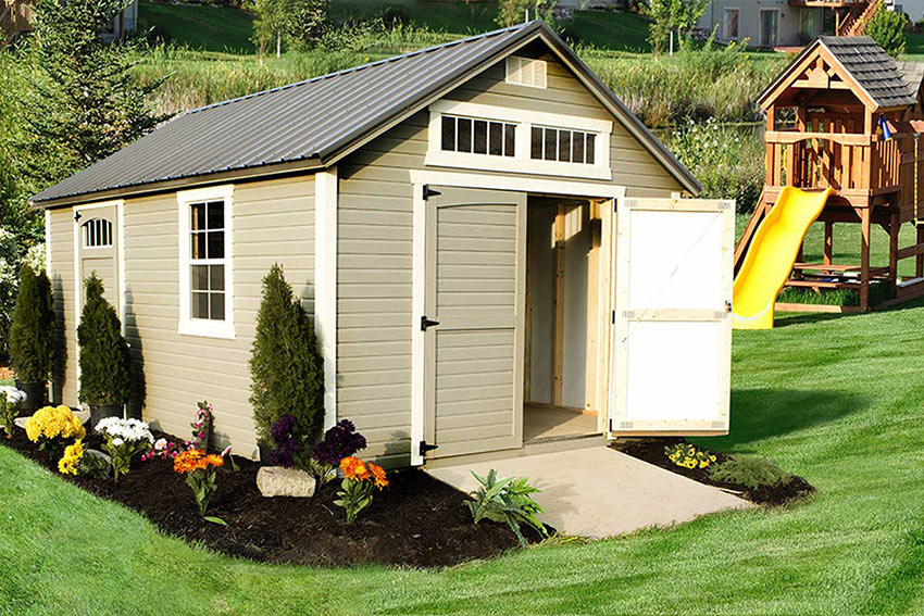 <li>Clay color Dutchlap siding,
Navajo White color Trim,
Charcoal color Roof,
Wooden Single door with Transom Window and classic arch,
Wooden Double doors with garden arch,
double Transom window and 24 x 36 window</li>